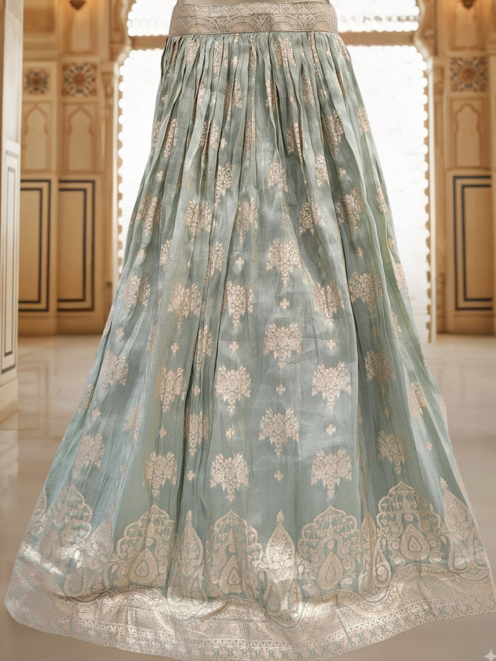 Pastel Green Banarasi Silk Lehenga Choli Set with Zari Woven Mughal Paisley Motifs