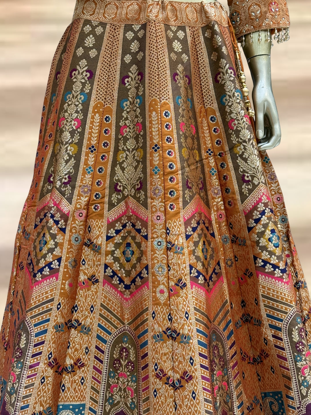 Orange Silk Multicolor Kalidar Lehenga Choli with Zari Weaving, Mirror Embroidered Blouse & Tassels