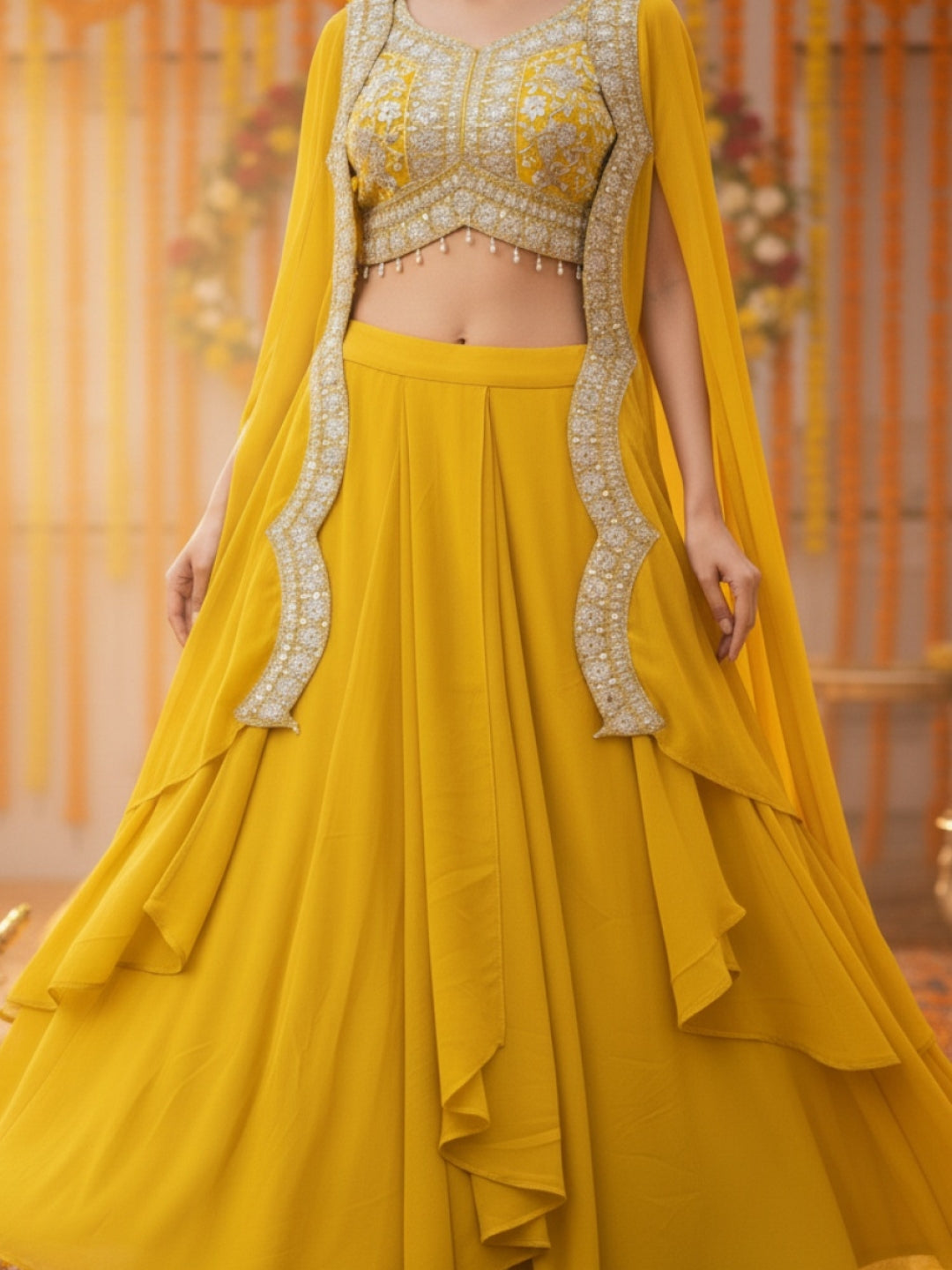 Haldi Yellow Embroidered Mirror Work Tasseled Blouse With Draped Skirt & Scalloped Cape