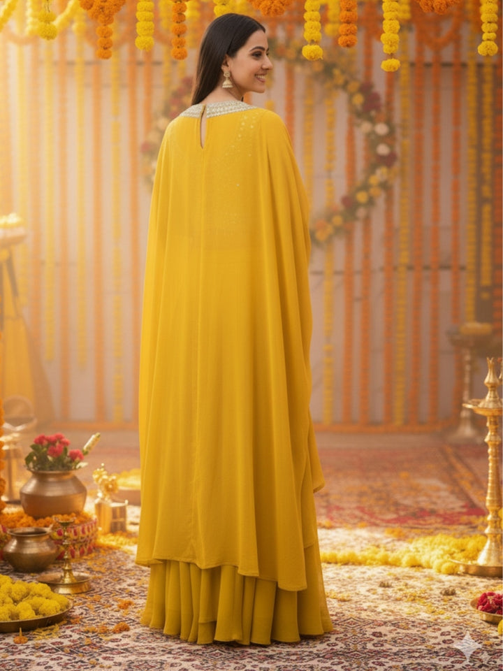 Haldi Yellow Embroidered Mirror Work Tasseled Blouse With Draped Skirt & Scalloped Cape