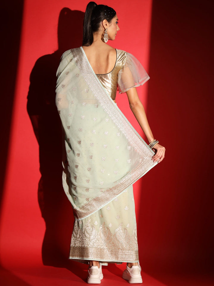 Pastel Zari Embroidered & Crystal Studded Georgette Party Wear Saree