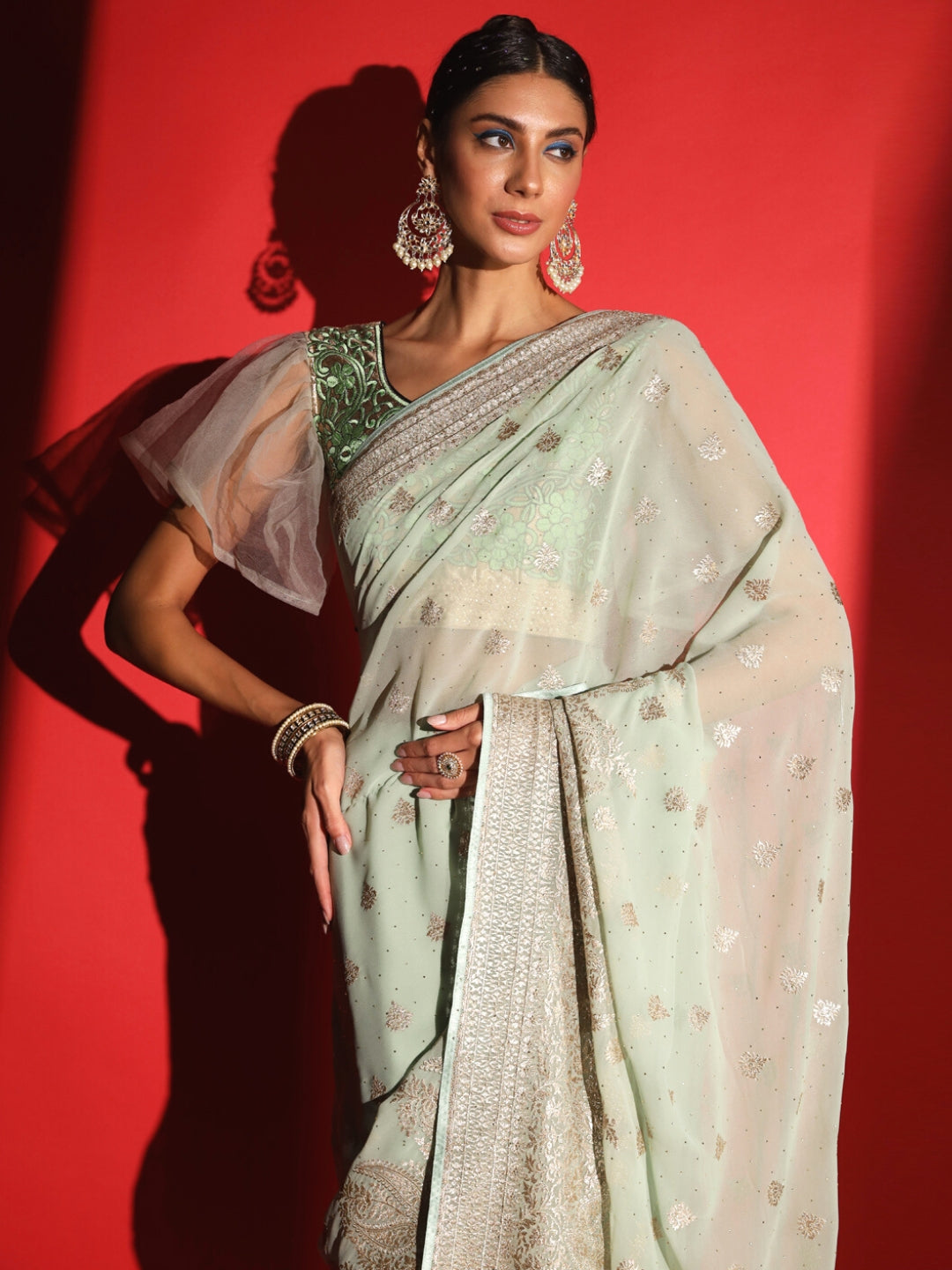 Pastel Zari Embroidered & Crystal Studded Georgette Party Wear Saree