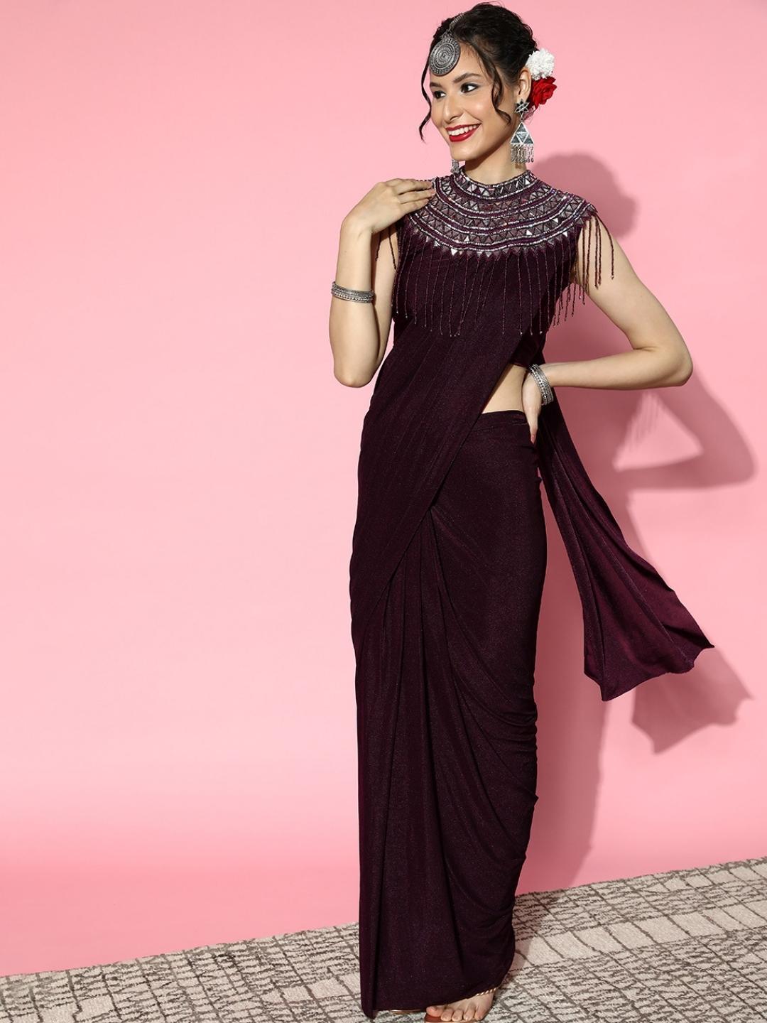Burgundy Lycra Saree with Mirror Embellished Tassled Necklace Cape