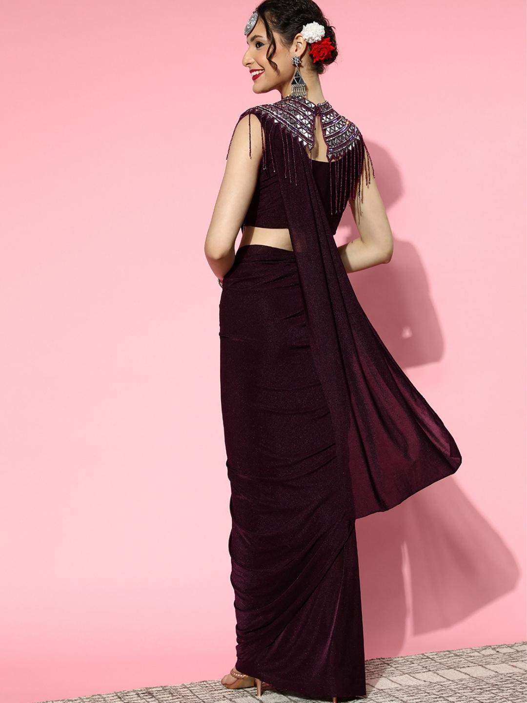 Burgundy Lycra Saree with Mirror Embellished Tassled Necklace Cape