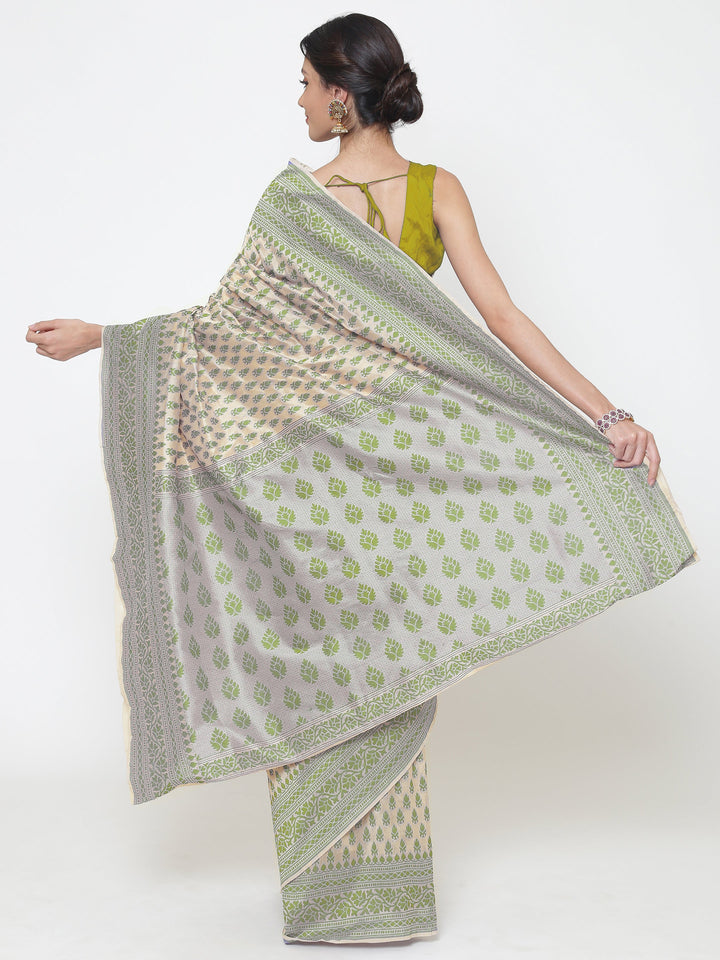 Cream Green Cotton Silk saree with handloom weaving floral patterns and a broad border