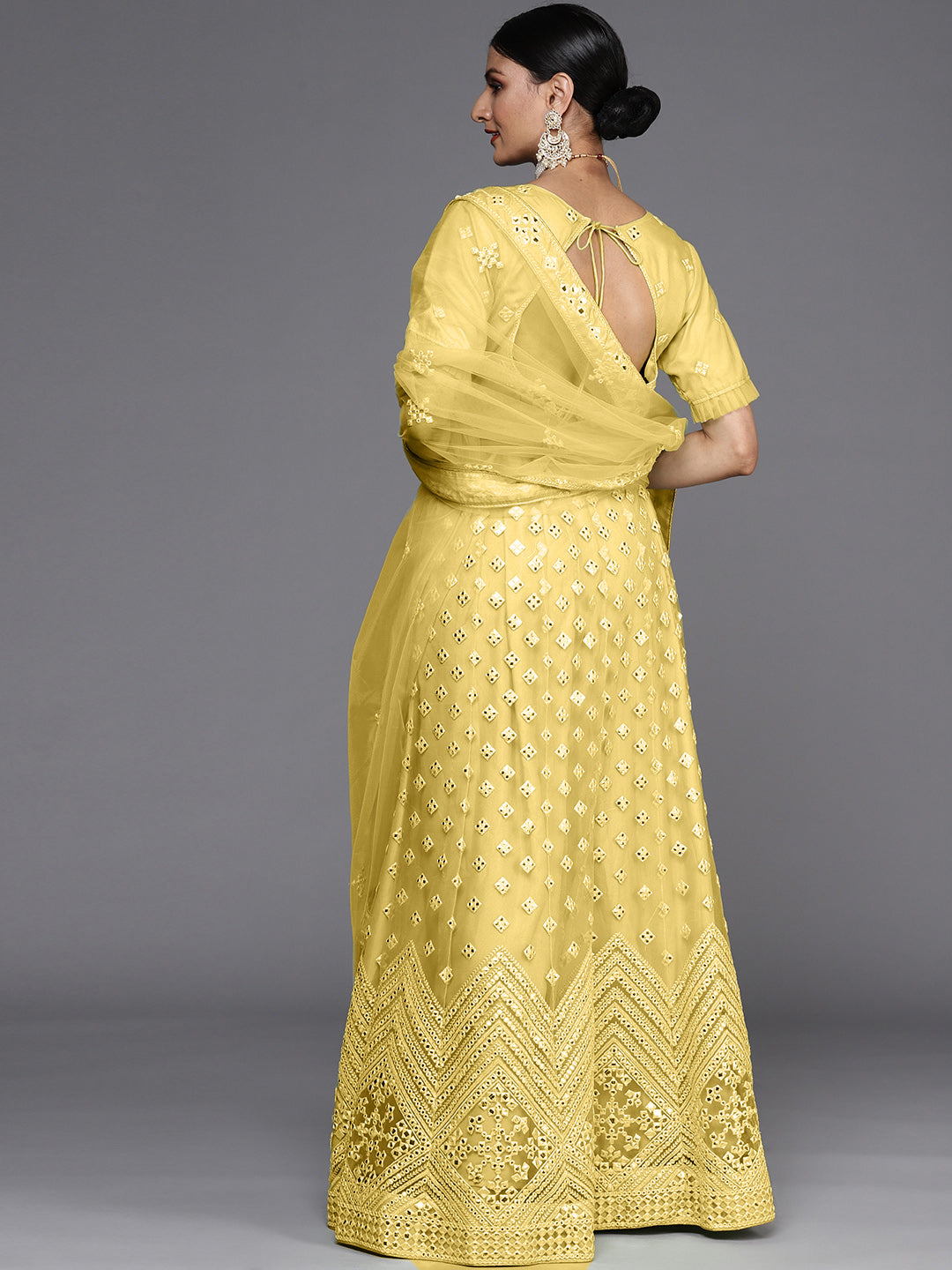 Semi Stitch Yellow Mirror Embellished Chevron Net Lehenga Choli Set