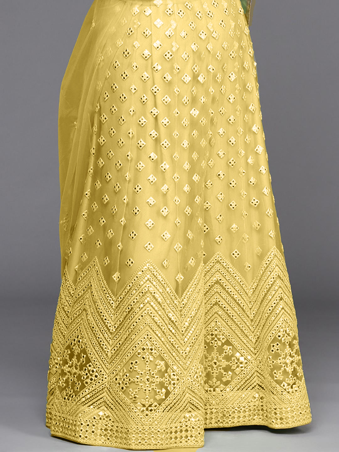 Semi Stitch Yellow Mirror Embellished Chevron Net Lehenga Choli Set