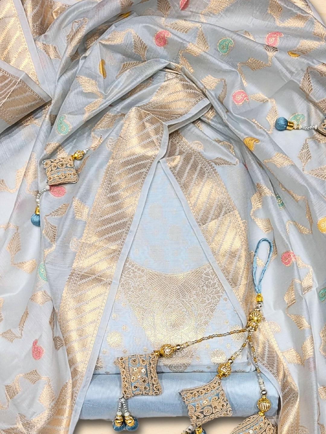 Banarasi Tissue Pastel Dress Material with Zari Weaving  & Jhallar Meenakari Dupatta