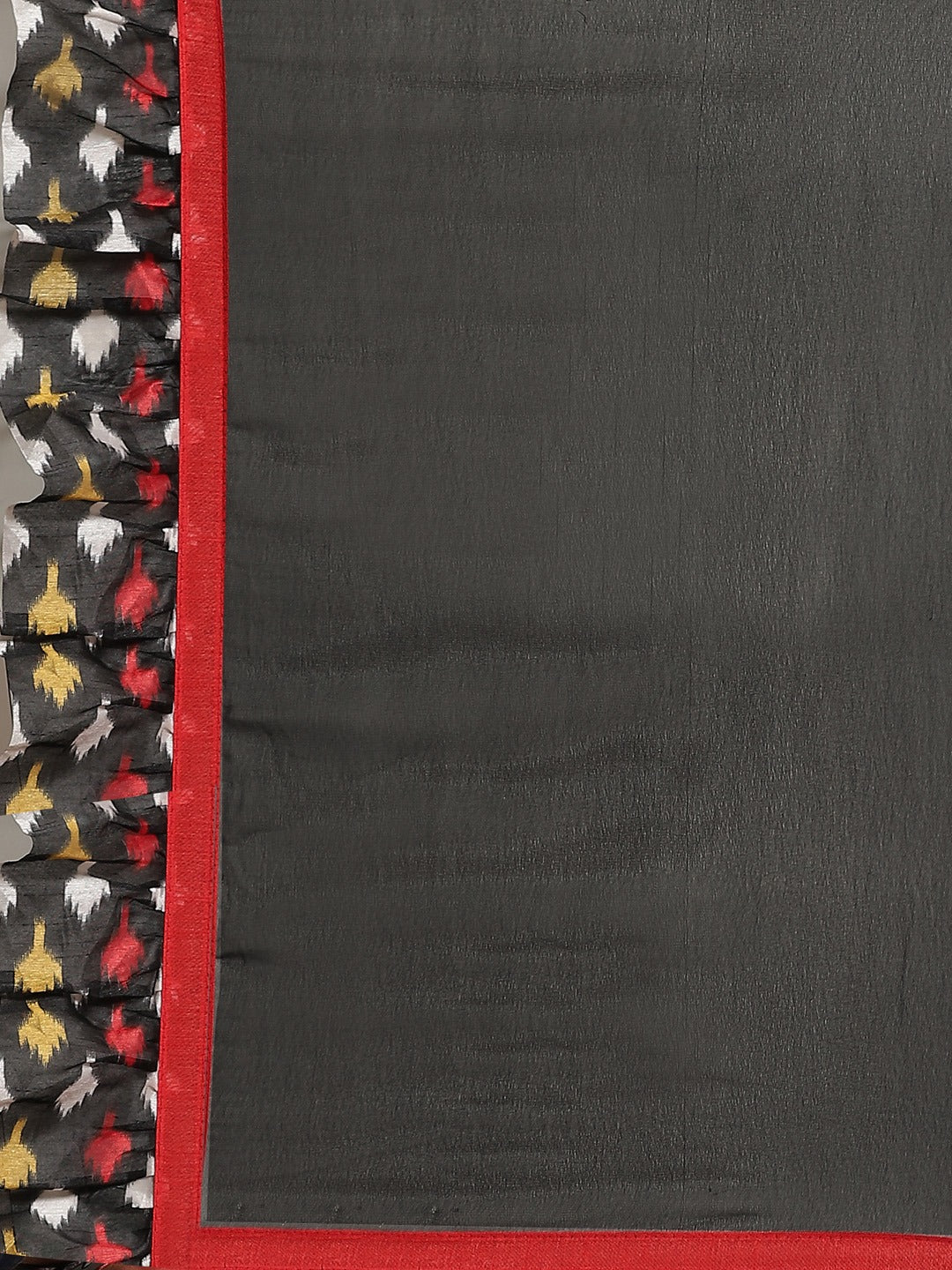 Fusion Black Georgette Ruffed Saree With Bold Ikat inspired Prints