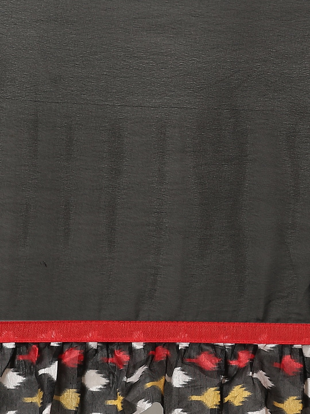 Fusion Black Georgette Ruffed Saree With Bold Ikat inspired Prints