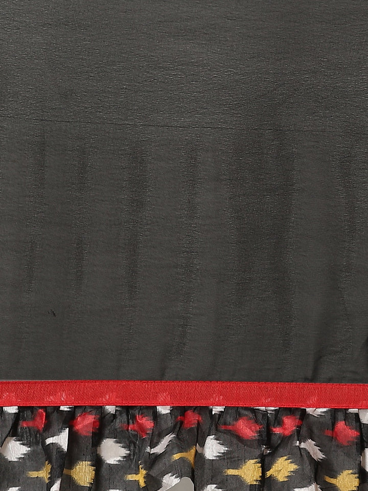 Fusion Black Georgette Ruffed Saree With Bold Ikat inspired Prints