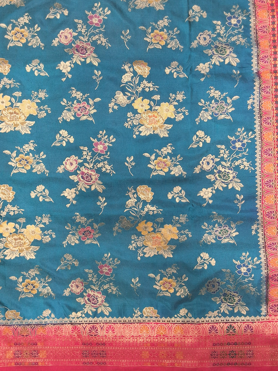 Teal Blue Banarasi Silk Saree with Multicolor Floral Weave and Contrast Pink Border