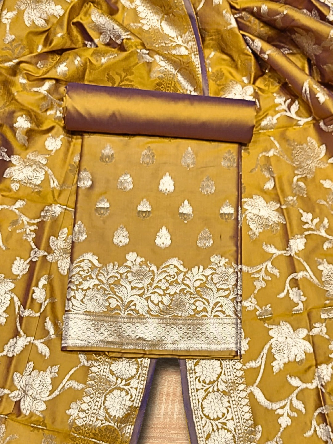 Chhabra 555 Banarasi Satin Silk Dress Material with Floral Zari Weave & Tasseled dupatta 