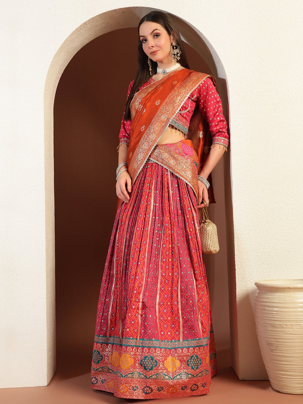 Chhabra 555 Rajasthani Poshak Lehenga with Tasseled Cut-out Blouse and Banarasi Handloom Dupatta