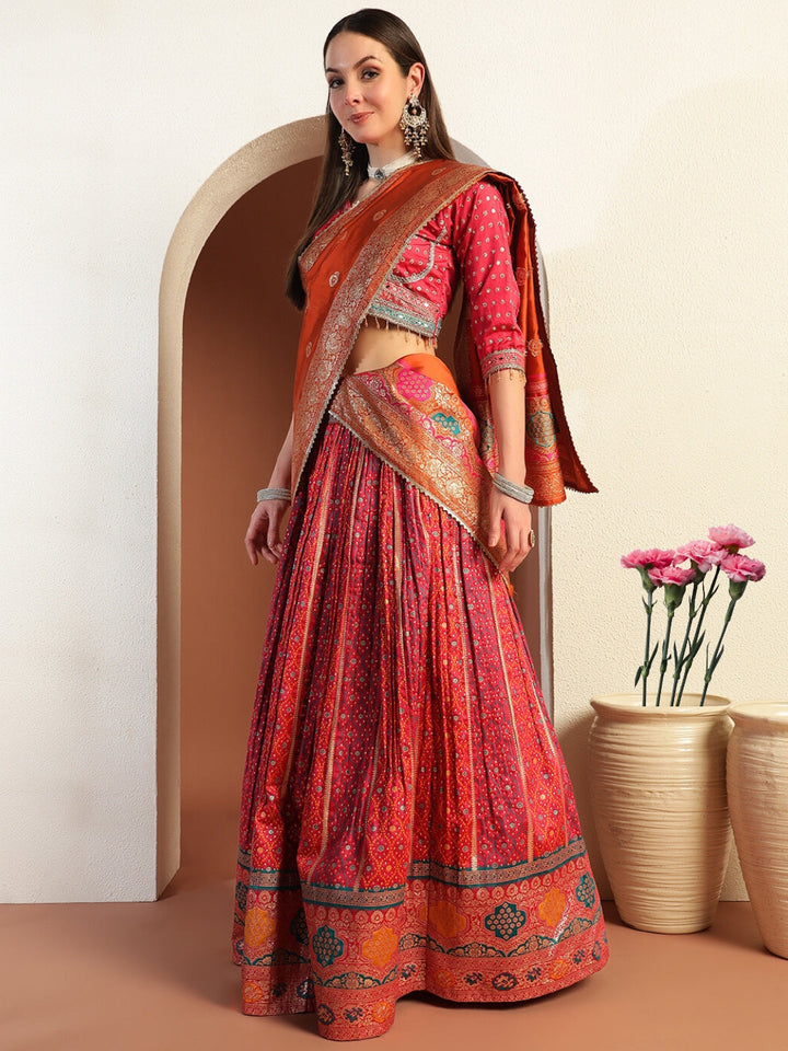 Chhabra 555 Rajasthani Poshak Lehenga with Tasseled Cut-out Blouse and Banarasi Handloom Dupatta