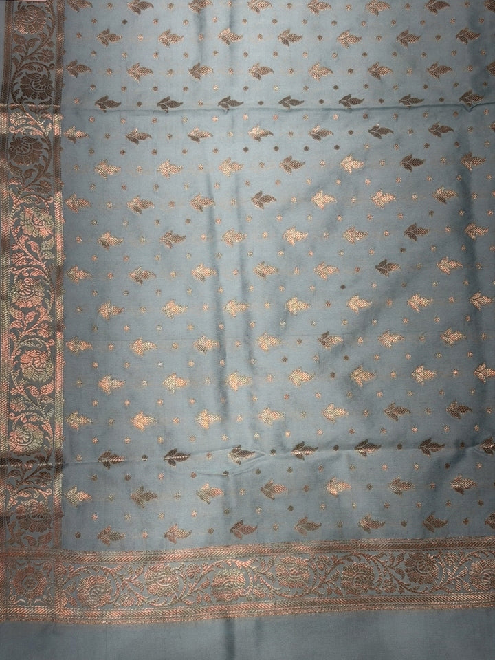 Powder Blue Zari Woven Banarasi Silk Dress Material with Floral Motif Jhalar dupatta