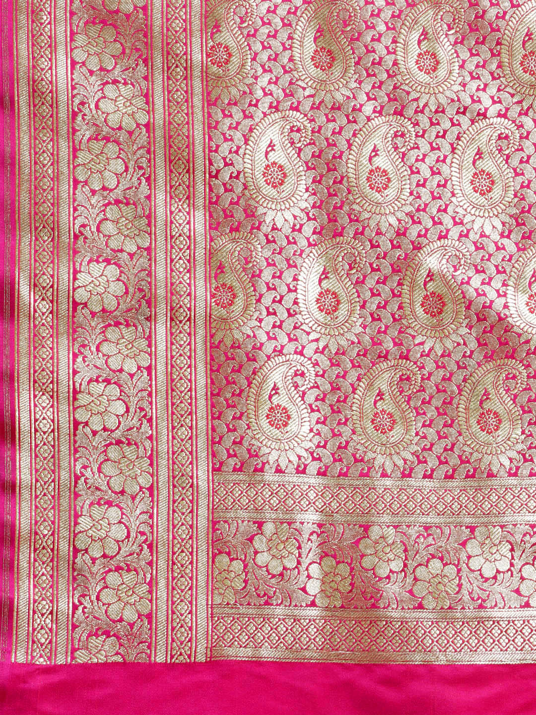 Kanjiwaram silk saree with intricate zari weaving in a jaal pattern