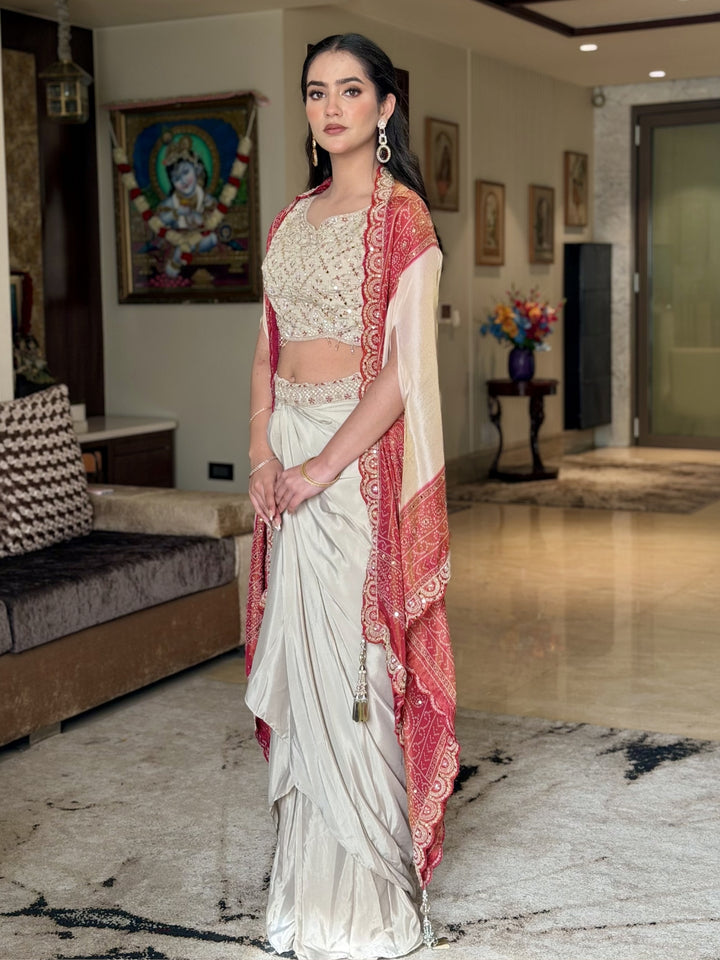 Aari Embroidered Tasseled Crop Top with Draped Skirt & Ombre Bandhej Scalloped Cape