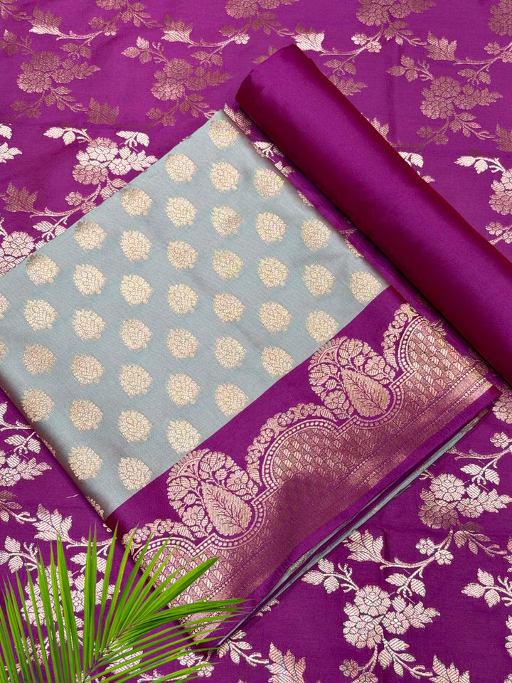 Banarasi Silk Colorblocked Dress Material with Tropical Zari Weaving & Jhalar Dupatta