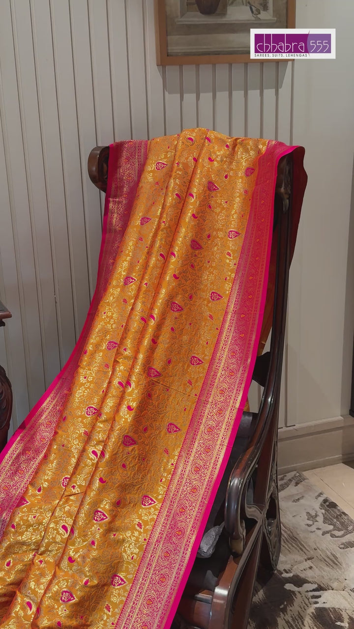 Golden Pink Zari Woven Banarasi Saree with Polka Dot Body & Floral Brocade Border