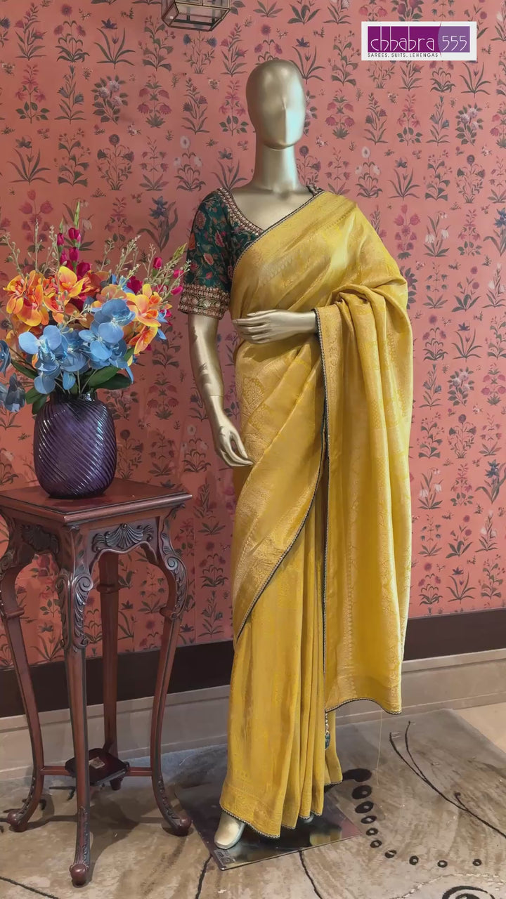 Yellow Jacquard Silk Woven Zari Saree with Slim Embellished Border for Festive Haldi Wear.