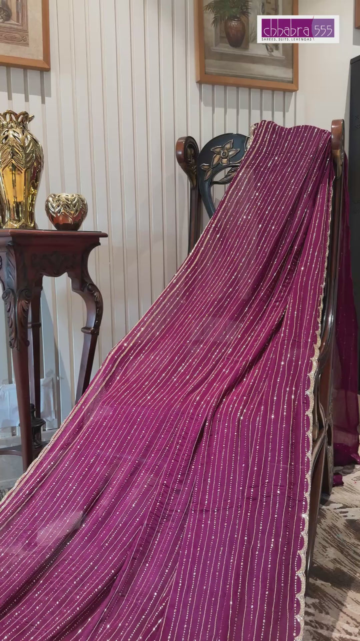 Magenta Chiffon Vertical Stripe Sequin Embellished Saree with Scalloped Sequin Border.