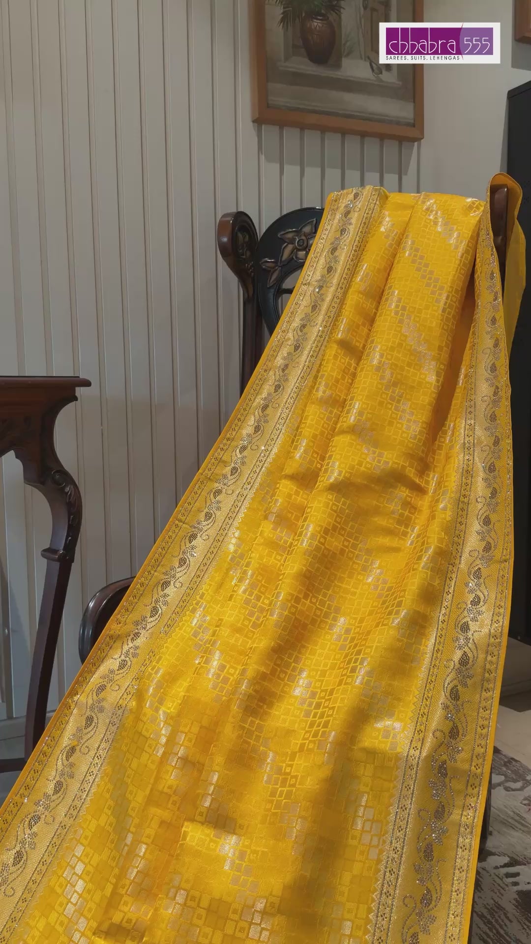 Yellow Banarasi Woven Checks Saree with Intricate Zari Border and Tasselled Pallu