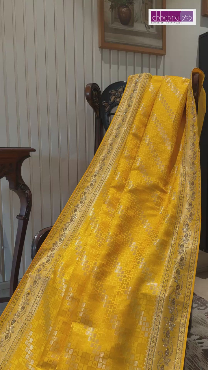 Yellow Banarasi Woven Checks Saree with Intricate Zari Border and Tasselled Pallu