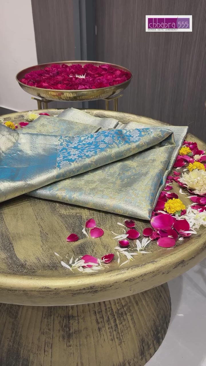 Iridescent Blue-Green Banarasi Silk Saree with Intricate Zari Weaving and Floral Brocade Pallu