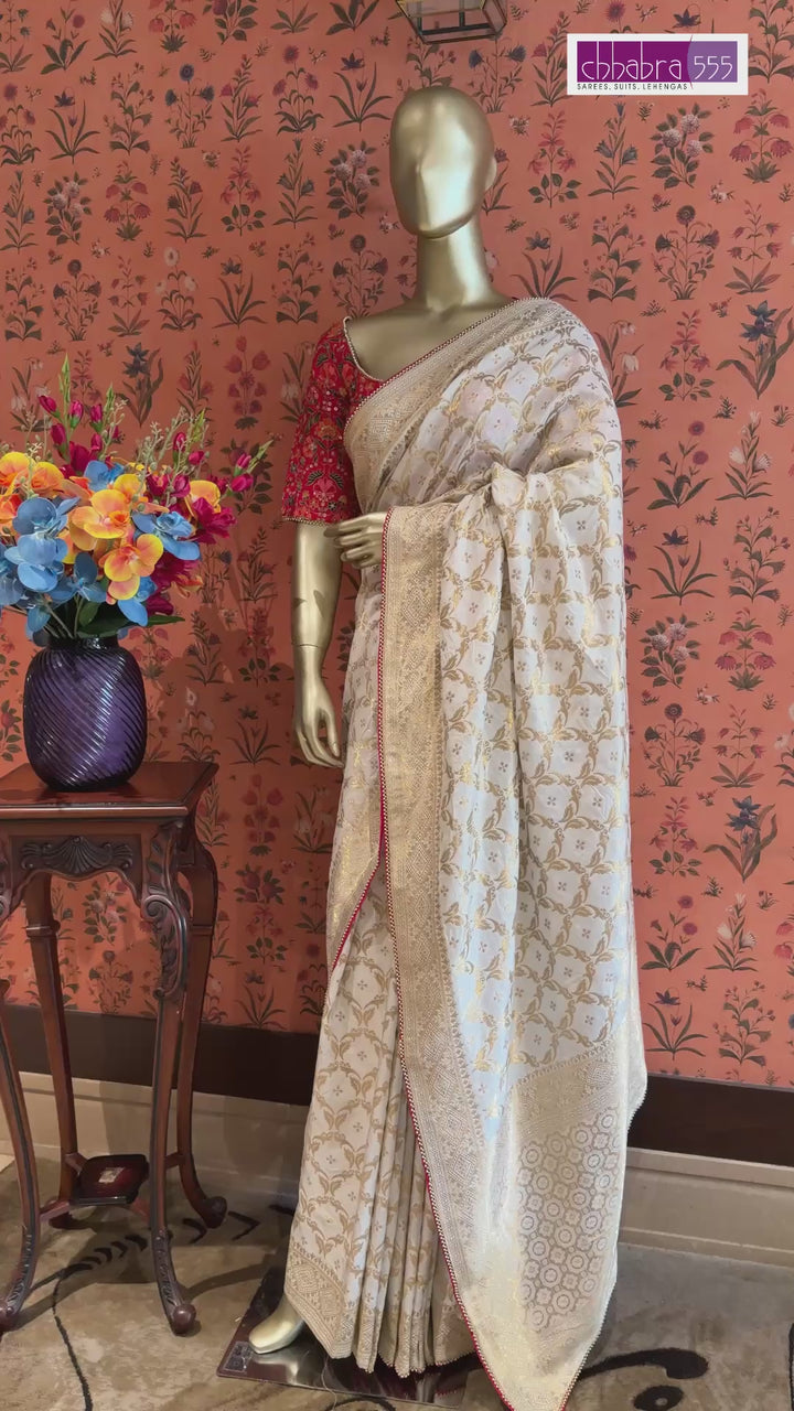 Off White Gold Zari Woven Floral Saree with Rich Pallu and Contrast Red Edging