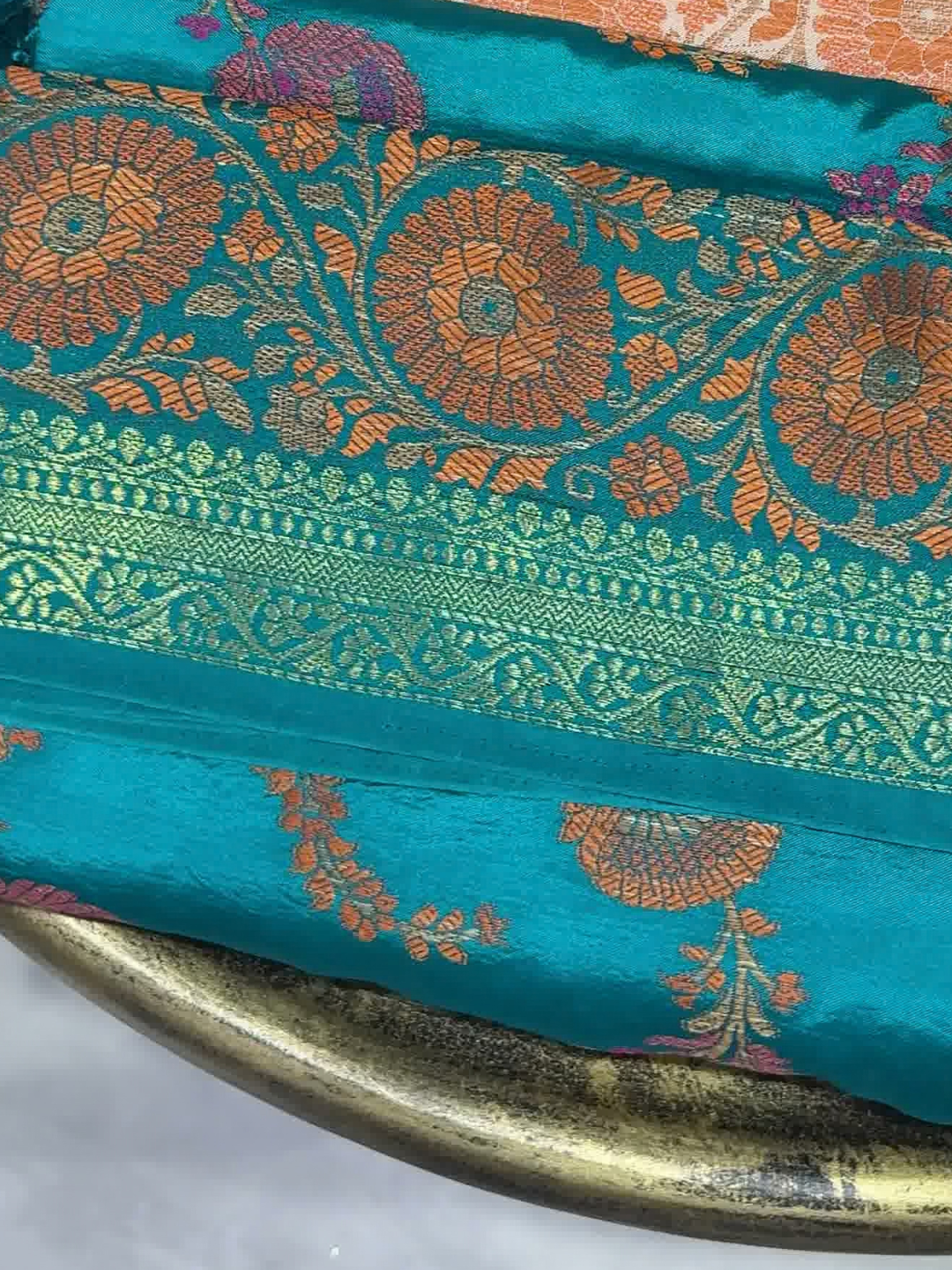 Teal Blue Banarasi Silk Saree with Zari floral and vines Motifs and Tassel Border