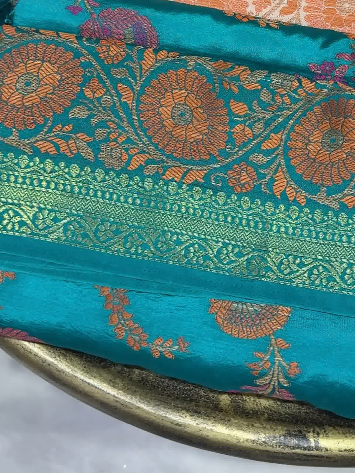 Teal Blue Banarasi Silk Saree with Zari floral and vines Motifs and Tassel Border