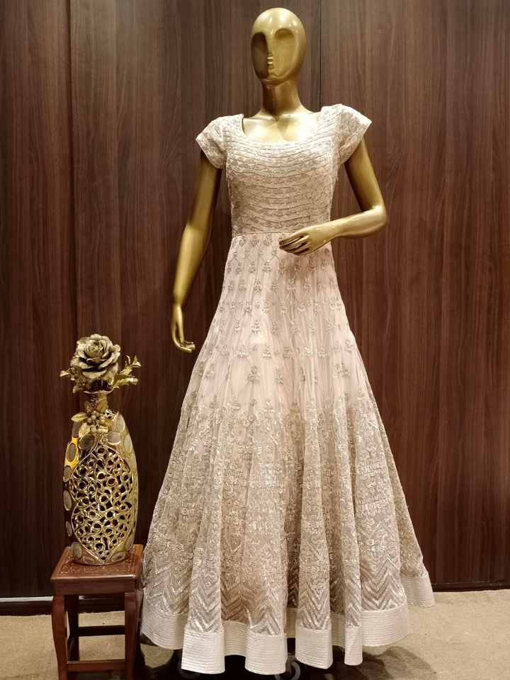 Beige Net Anarkali With Heavy Embroidery And Dupatta