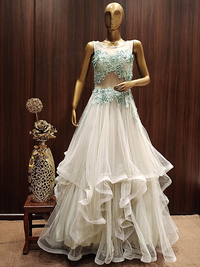 Pastel Green Ruffled Net Gown with Pearl,Thread Embroidery and Layering