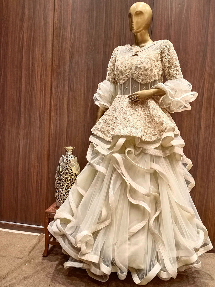 Gold Flared Net Gown with Ribbon Embroidery & Ruffles And Layering