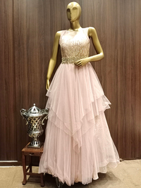 Rose Gold Flared Net Gown With Ruffled Layering & Floral Sequence Embroidery
