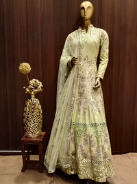 Pastel Green Mirror Embellished Raw Silk Anarkali with Resham embroidery in Ethnic Pattern