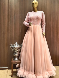 Pastel Peach Flared Gown With Ruffled Hemline and Thread Embroidery