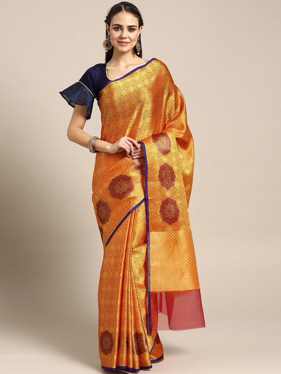 Chhabra 555 Mustard Banarasi Brocade Silk saree with Zari weaving in a floral pattern and self embossed ethnic motifs and contrast Pink Blouse