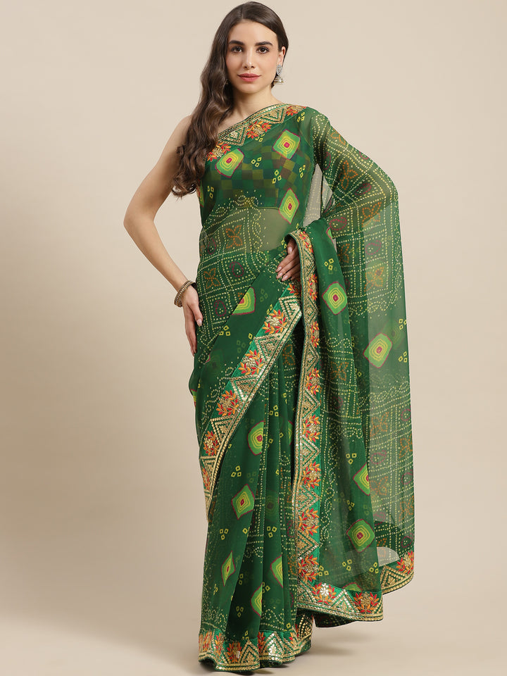 Chhabra 555 Green Jaipur Bandhani Prints Geogette Saree With Resham & Gota Patti Embroidery Border

Color: Green

Type: Bandhani Sarees

Pattern: Printed

Pattern Type: Bandhani

Ornamentation: Gotta Patti

Border: Embroidered

Fabric: Georgette

Saree length: 5.40 mtr., Width: 1.10 mtr, Blouse length: 0.70 mtr
Dry Clean

The CAD image gives a detailed look of the actual blouse piece that comes with this saree. The blouse used by the model in the pictures is only for styling purpose.
