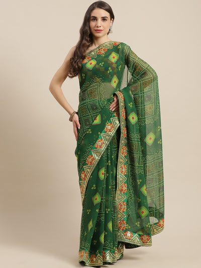 Chhabra 555 Green Jaipur Bandhani Prints Geogette Saree With Resham & Gota Patti Embroidery Border

Color: Green

Type: Bandhani Sarees

Pattern: Printed

Pattern Type: Bandhani

Ornamentation: Gotta Patti

Border: Embroidered

Fabric: Poly Georgette

Saree length: 5.40 mtr., Width: 1.10 mtr, Blouse length: 0.70 mtr
Dry Clean

The CAD image gives a detailed look of the actual blouse piece that comes with this saree. The blouse used by the model in the pictures is only for styling purpose.
