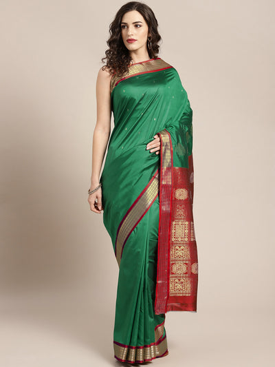 Chhabra 555 Narayanpet Green Silk saree with Zari Weaving Contrast Border and Rich Temple Pallu

Color: Green

Type: Narayan Peth Sarees

Pattern: Woven Design

Pattern Type: Ethnic Motifs

Ornamentation: Zari

Border: Woven Design

Fabric: Silk Blend

Saree: 5.4 mtr., Width: 1.1 mtr, Blouse: 0.7 mtr
Dry Clean Only

The CAD image gives a detailed look of the actual blouse piece that comes with this saree. The blouse used by the model in the pictures is only for styling purpose.