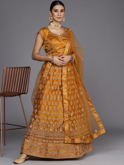 Chhabra 555 Semi-Stitched Gold Aari Embroidery Party Wear Net Lehenga Set with Embellished Dupatta