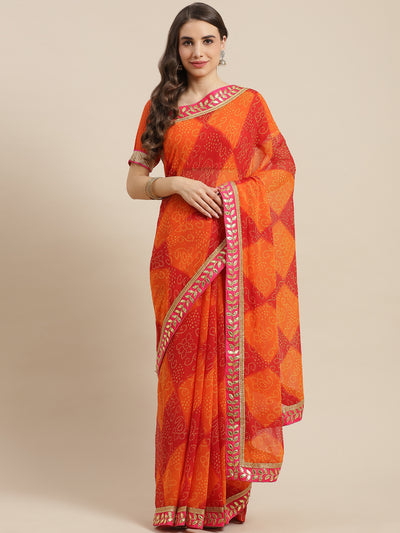 Chhabra 555 Red & Orange Georgette Bandhani Print Saree Embellished & Gota Patti Jaipuri Border

Color: Red & Orange

Type: Bandhani Sarees

Pattern: Printed

Pattern Type: Bandhani

Ornamentation: Gotta Patti

Border: Embroidered

Fabric: Poly Georgette

Saree length: 5.40 mtr., Width: 1.10 mtr, Blouse length: 0.70 mtr
Dry Clean

The CAD image gives a detailed look of the actual blouse piece that comes with this saree. The blouse used by the model in the pictures is only for styling purpose.
