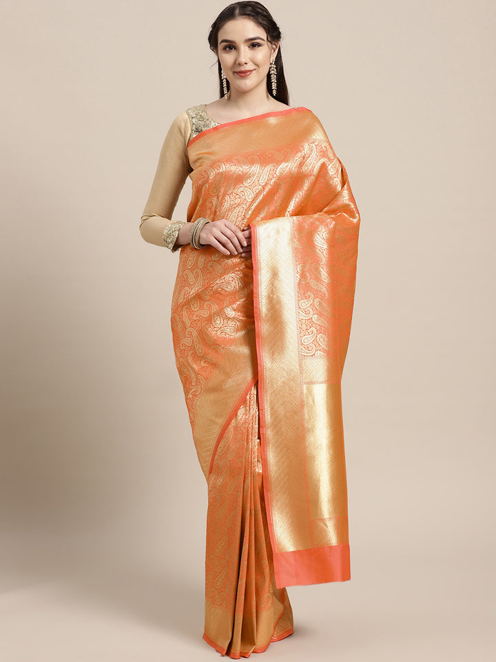 Chhabra 555 Kanjiwaram inspired silk saree with intricate zari weaving in a stylish paisley pattern

Color: Orange

Type: Kanjeevaram Sarees

Pattern: Woven Design

Pattern Type: Paisley

Ornamentation: Zari

Border: Woven Design

Fabric: Silk Blend

Saree: 5.4 mtr., Width: 1.10 mtr, Blouse: 0.80 mtr
Dryclean Only

The CAD image gives a detailed look of the actual blouse piece that comes with this saree. The blouse used by the model in the pictures is only for styling purpose.