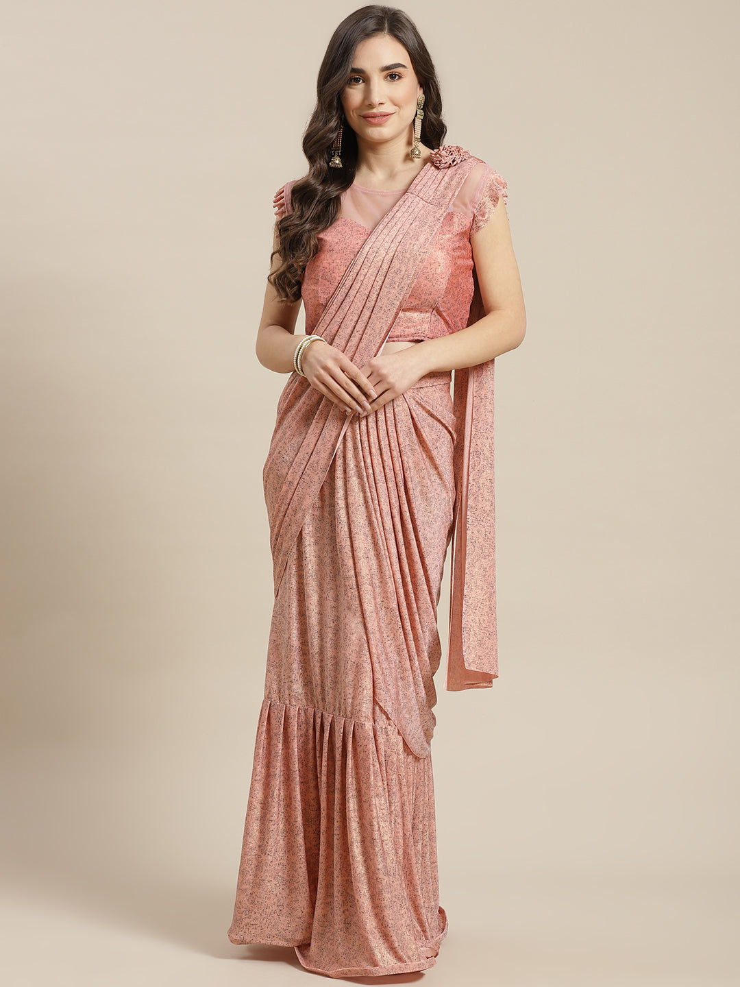 Chhabra 555 Ruffled Pre-Stitched Draped Pastel Pink Shimmer Georgette Embellished Pleated Saree

Color: Pink

Type: NA Sarees

Pattern: Printed

Pattern Type: Abstract

Ornamentation: Embroidered

Border: No Border

Fabric: Georgette

Saree length: 5.50 mtr., Width: 1.10 mtr, Blouse Height: 16 inches
Dry Clean only

The CAD image gives a detailed look of the actual blouse piece that comes with this saree. The blouse used by the model in the pictures is only for styling purpose.