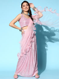 Chhabra 555 Ruffled Pre-Draped Pastel Pink Tulle Sequin Embellished Saree with Stitched blouse

Color: Baby Pink
Type: Ruffled Half-and-Half Saree
Pattern: Embellished
Ornamentation: Sequinned
Fabric: Net

Saree length: 5.40 mtr., Width: 1.10 mtr, Blouse Height: 14 inches
Dry Clean only. Net part of the saree contains Nylon threads

The CAD image gives a detailed look of the actual blouse piece that comes with this saree. The blouse used by the model in the pictures is only for styling purpose.