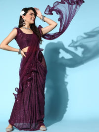 Chhabra 555 Ruffled Pre-Stitched Draped Bright Burgundy Tulle Saree with Sequin Embellished blouse

Color: Burgundy

Type: Ruffled Half-and-Half Saree
Pattern: Embellished
Ornamentation: Sequinned
Fabric: Net

Saree length: 5.40 mtr., Width: 1.10 mtr, Blouse Height: 14 inches
Dry Clean only. Net part of the saree contains Nylon threads

The CAD image gives a detailed look of the actual blouse piece that comes with this saree. The blouse used by the model in the pictures is only for styling purpose.