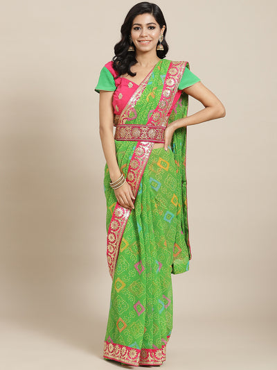 Chhabra 555 Green Bandhani Print Georgette Belted Saree with Multicolor Gota Patti Embroidery

Color: Green

Type: Bandhani Sarees

Pattern: Embroidered

Pattern Type: Bandhani

Ornamentation: Gotta Patti

Border: Embellished

Fabric: Poly Georgette

Saree length: 5.40 mtr., Width: 1.10 mtr, Blouse length: 0.75 mtr
Dry Clean only

The CAD image gives a detailed look of the actual blouse piece that comes with this saree. The blouse used by the model in the pictures is only for styling purpose.