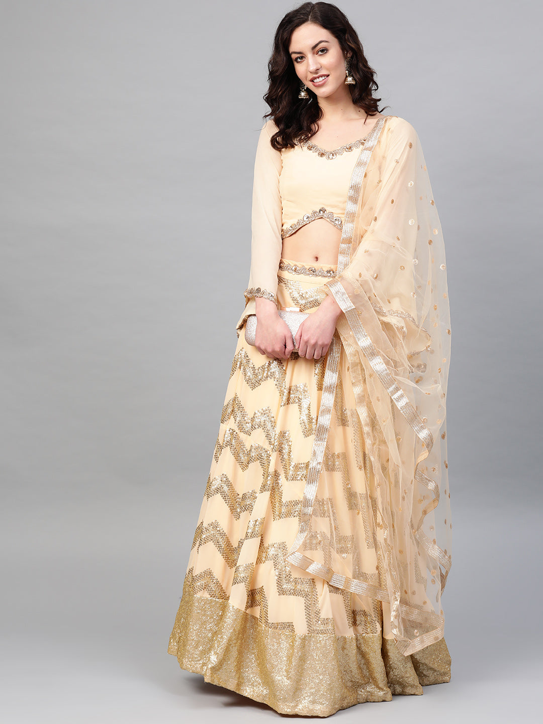 Chhabra 555 Made-to-Measure Crop Top Lehenga Set with Contemporary Sequinned patterns, Broad embroidered border and flowy bell sleeves